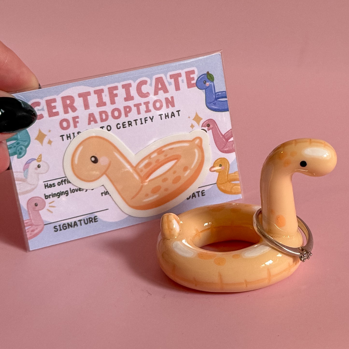 Pastel Orange Dino Pool Floatie Ring Holder